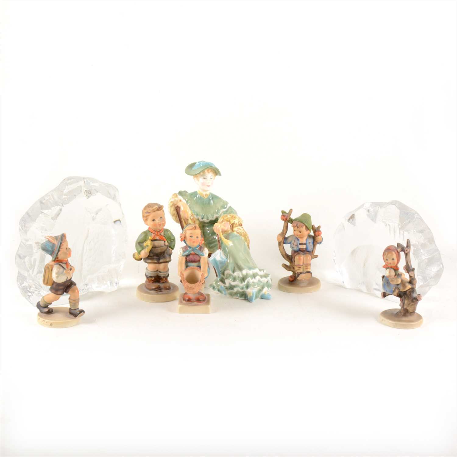 Lot 84 - A collection of decorative figures and Swedish glass paperweights