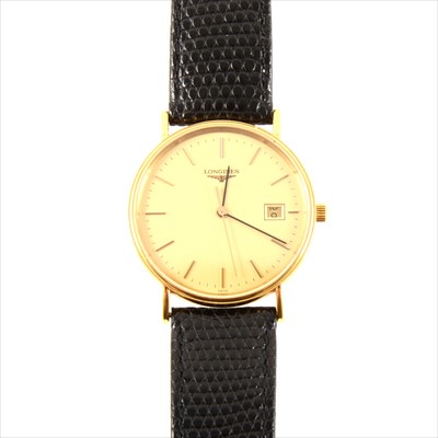 Lot 475 - Longines - a gentleman's gold-plated wrist watch.