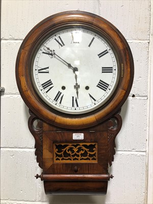 Lot 671 - A drop dial twin train wall clock with 28cm white enamel dial, 70cm mahogany case, striking on a gong, fret panel to glazed door.