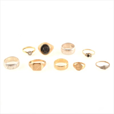 Lot 453 - Seven gold rings and two silver rings.