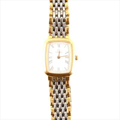 Lot 472 - Omega - a lady's quartz gold-plated and steel bracelet watch.