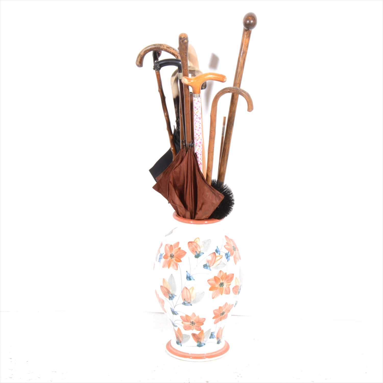 Lot 150 - Small quantity of sticks parasols and umbrellas, in large modern pot.
