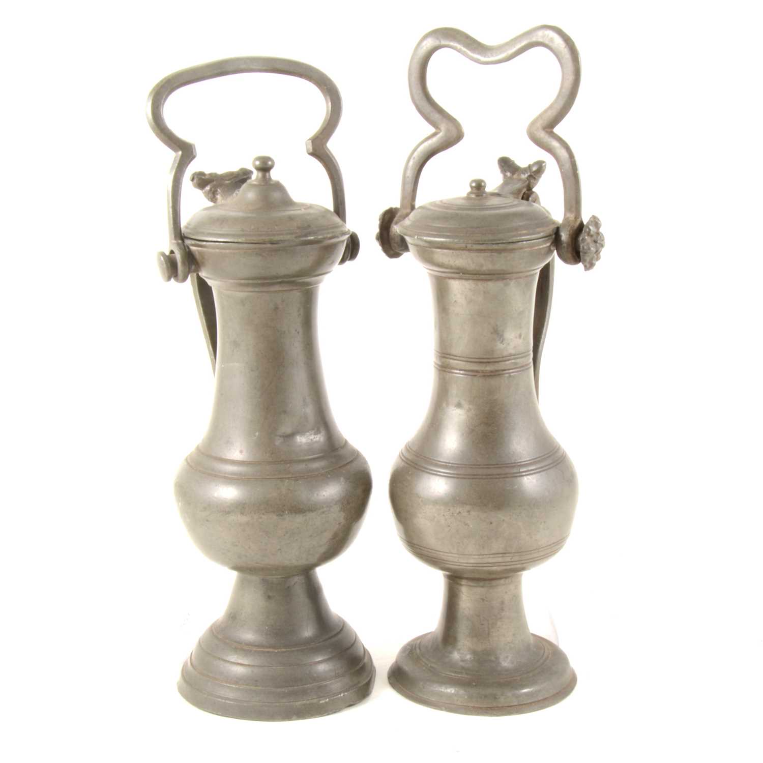 Lot 155 - Two French pewter wine flagons, 18th century