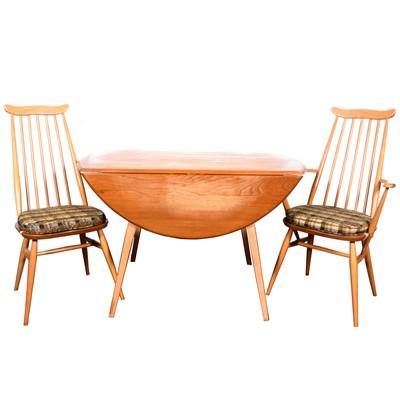 Lot 667 - An elm and beech drop-leaf table and four chairs by Ercol
