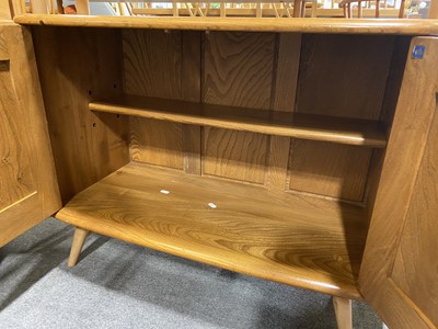 Lot 672 - An elm and beech room divider by Ercol, model 363