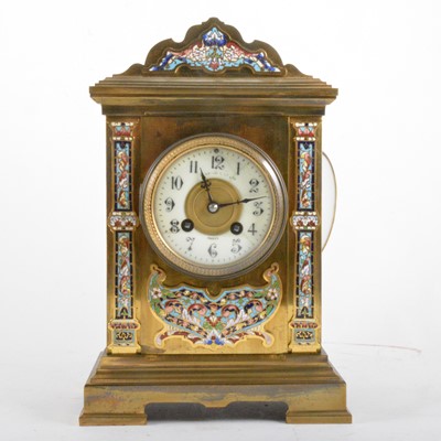 Lot 229 - A French lacquered brass and champleve enamel mantel clock