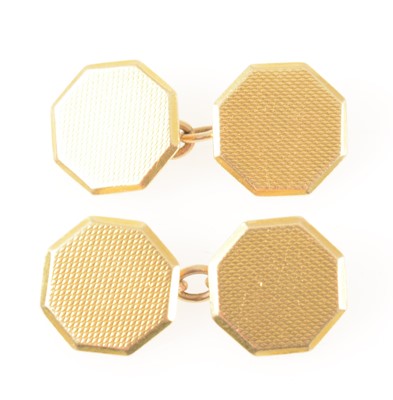 Lot 136 - A pair of 18 carat yellow gold engine turned octagonal chain link cufflinks.