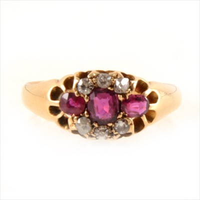 Lot 446 - A ruby and diamond ring.