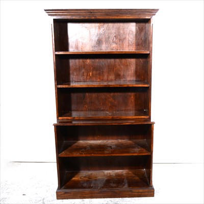 Lot 571 - A set of oak open bookshelves, in two sections,...