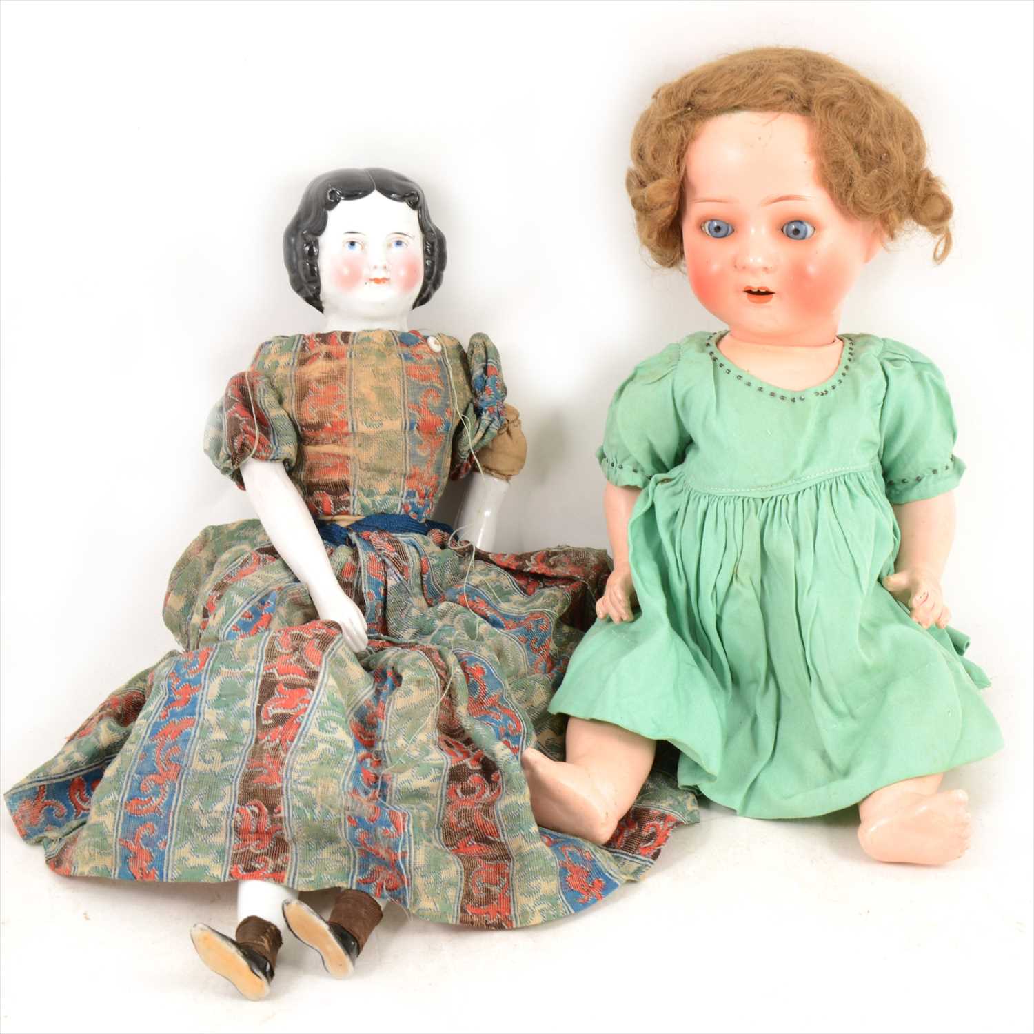 Lot 382 - Two German dolls, a Heubach Koppelsdorf 320-2/0 head and a glazed shoulder head doll.