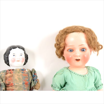 Lot 382 - Two German dolls, a Heubach Koppelsdorf 320-2/0 head and a glazed shoulder head doll.