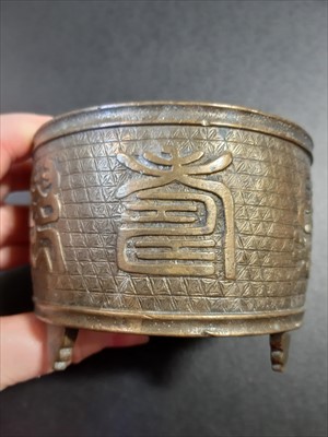 Lot 127 - A small Chinese bronze jardinière, ...