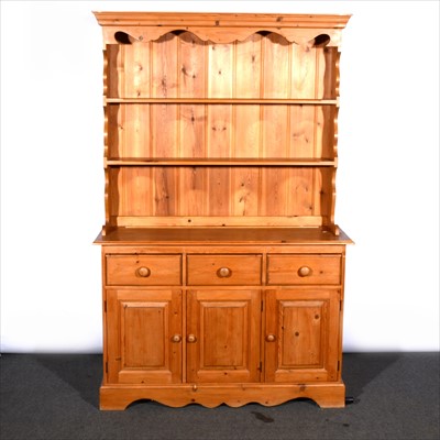 Lot 471 - A modern pine dresser, with a two shelf delft rack