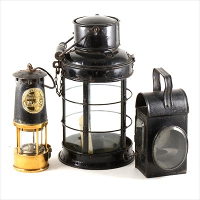 Lot 239 - A brass and steel miners safety lamp, model SL, Protector Lamp and Lighting Co Limited