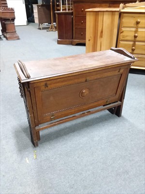 Lot 442 - An oak folding campaign camp bed.