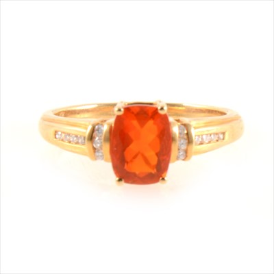 Lot 442 - A Mexican fire opal and diamond ring.