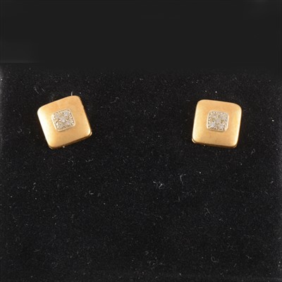 Lot 210 - A pair of 14k satin finish earrings