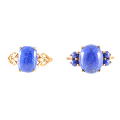 Lot 204 - Two lapis lazuli cabochon cut rings.