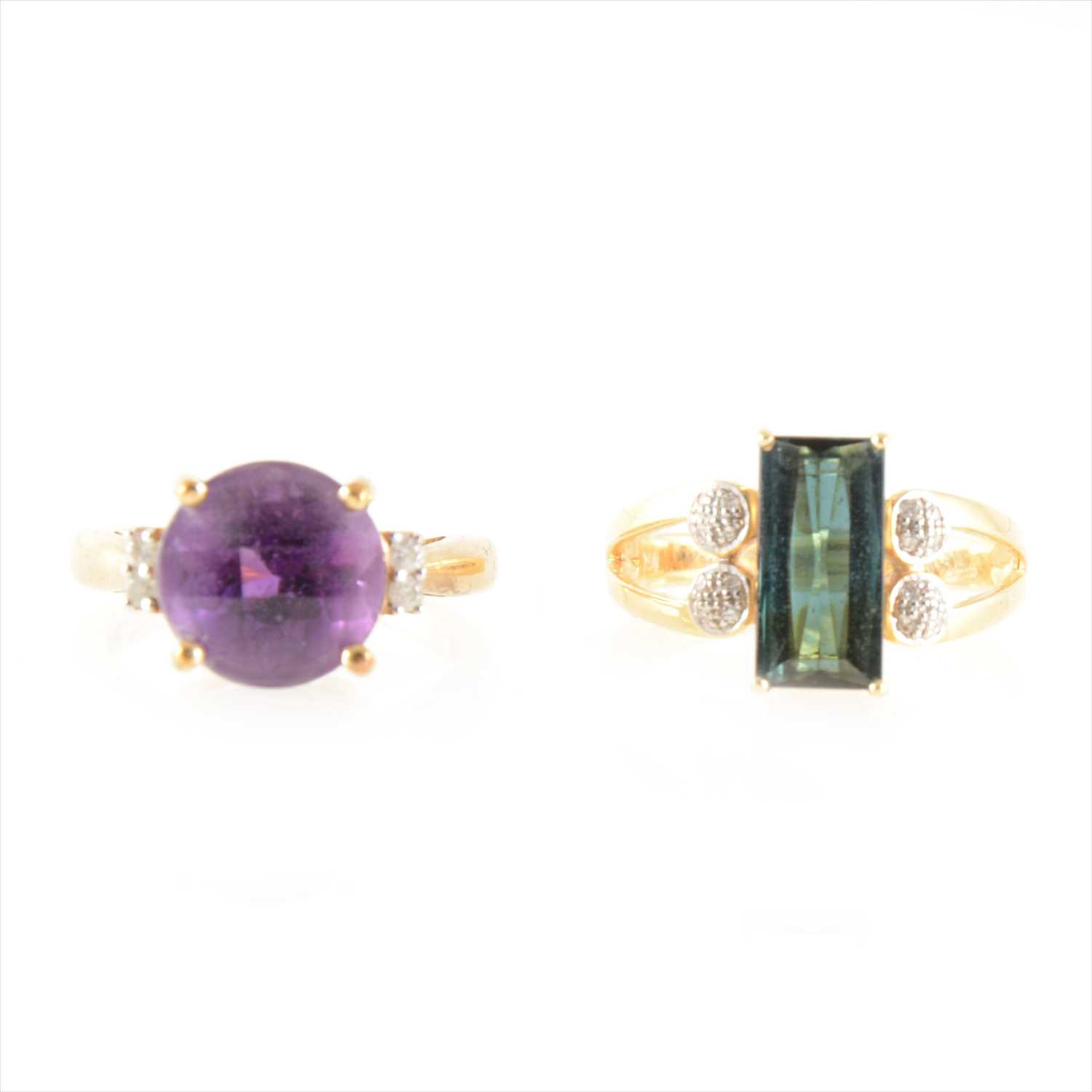 Lot 202 - A "Uruguayan" amethyst and diamond ring, and a tourmaline and clear stone ring.