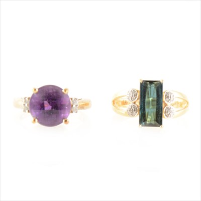 Lot 202A - A "Uruguayan" amethyst and diamond ring, and a tourmaline and clear stone ring.