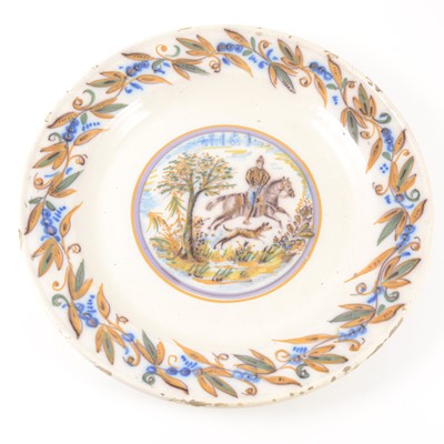 Lot 1056A - A French faience charger, 18th century