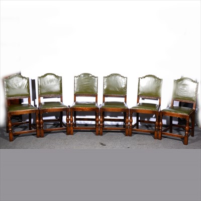 Lot 586 - A set of six oak dining chairs