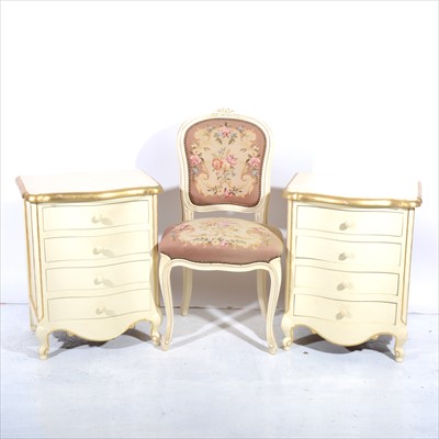 Lot 415 - A pair of cream painted and parcel gilt bedside chest of drawers