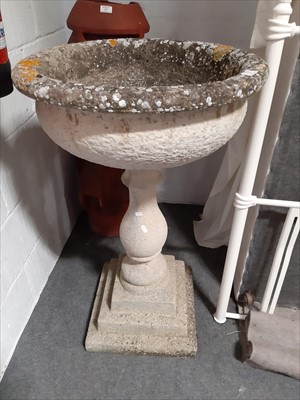 Lot 435 - A concrete pedestal garden urn, campagna shape bowl