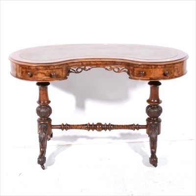 Lot 374 - A Victorian walnut kidney-shape writing table