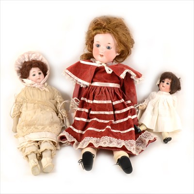 Lot 141 - Three bisque head dolls, including two Armand Marseille with 390 head stamps, 22cm, and 42cm, and another German bisque head doll, 35cm.