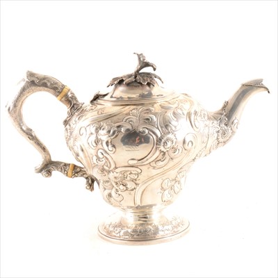 Lot 263 - An ornate William IV silver teapot, William...