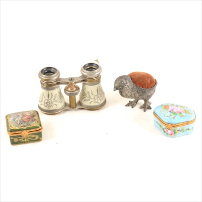 Lot 254 - Two Limoges enamel boxes, white metal and brass opera glasses, and a large white metal chick pin cushion.