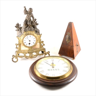 Lot 178 - A spelter, onyx and gilt metal mantel clock, wall clock, and a metronome