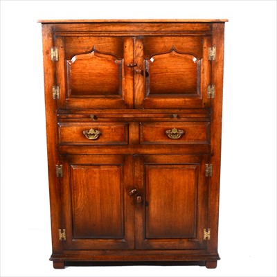 Lot 470 - A reproduction oak side cabinet