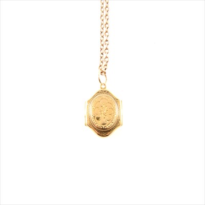 Lot 291 - A yellow metal locket and chain.