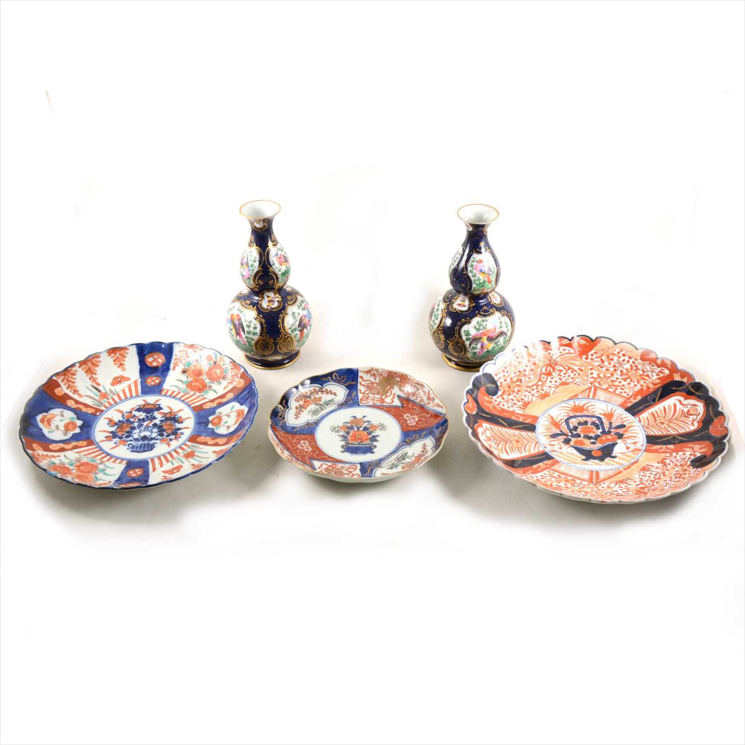 Lot 44 - Three Imari-ware plates, plus a pair of double gourd shape vases.