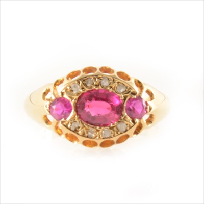 Lot 242 - An 18 carat yellow gold gemset ring.