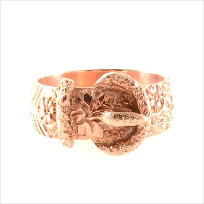 Lot 258 - A 9 carat rose gold buckle ring.