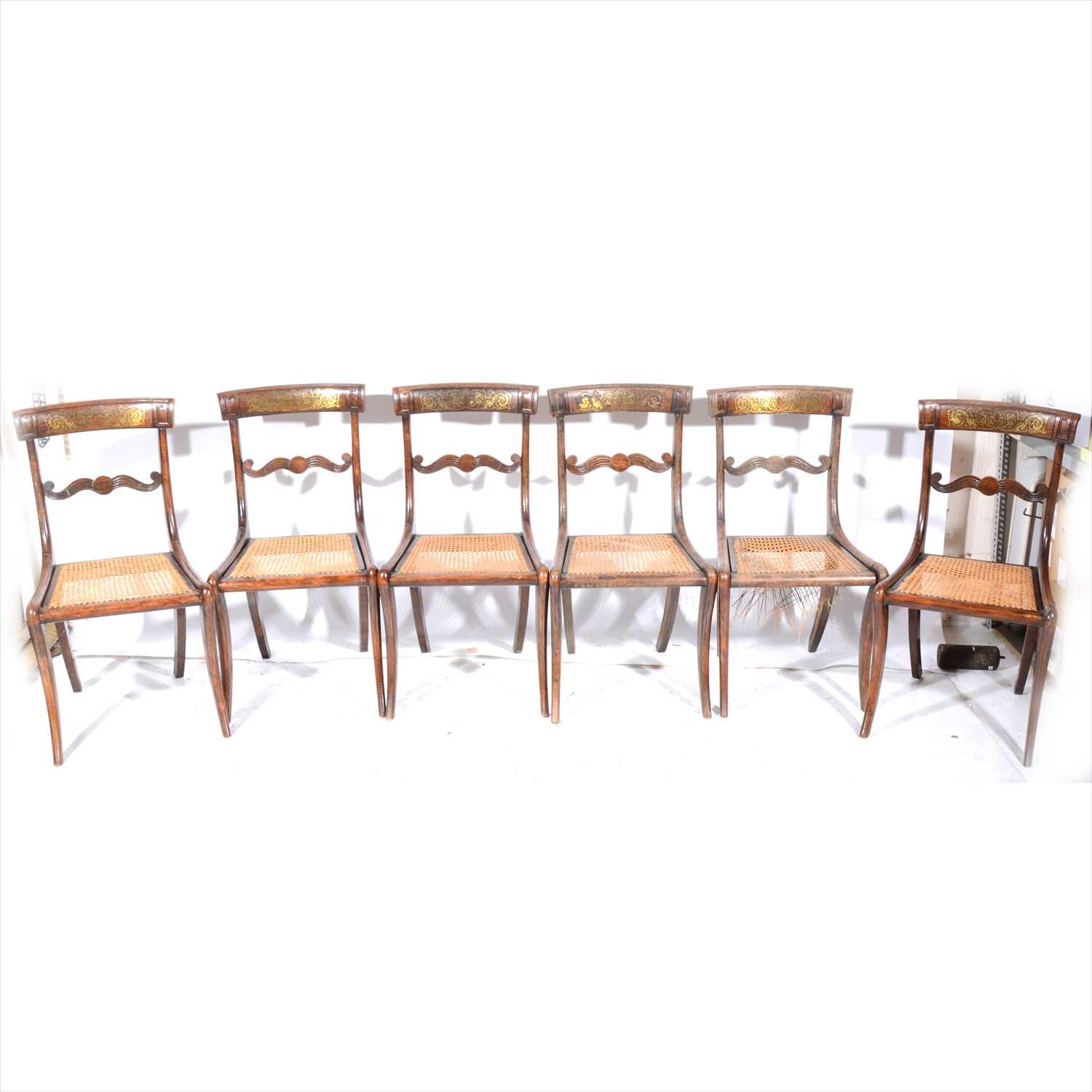 Lot 118 - A set of six Regency pattern stained beechwood dining chairs