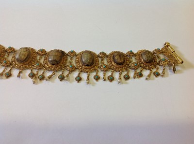 Lot 1332 - An unusual mid 19th Century Egyptian Revival yellow metal mounted ceramic scarab suite of jewellery.