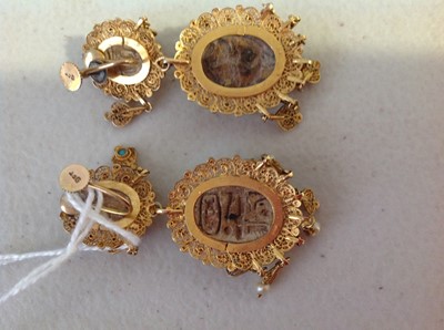 Lot 1332 - An unusual mid 19th Century Egyptian Revival yellow metal mounted ceramic scarab suite of jewellery.