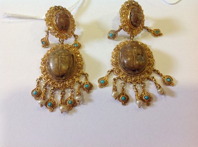 Lot 1332 - An unusual mid 19th Century Egyptian Revival yellow metal mounted ceramic scarab suite of jewellery.