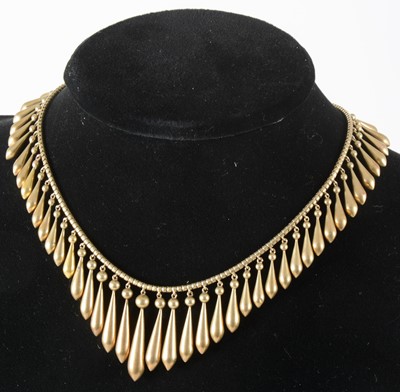 Lot 106 - A late 19th Century yellow metal fringe necklace.
