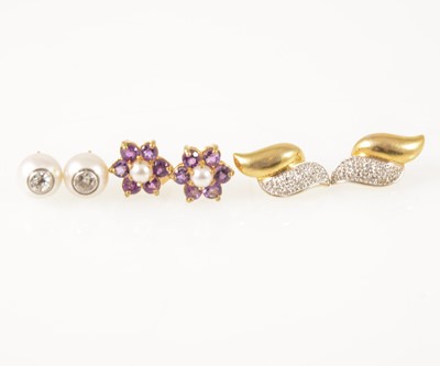 Lot 1236 - Three pairs of gemset ear studs.