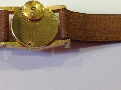 Lot 150 - Cartier - a lady's 18 carat yellow gold wrist watch.