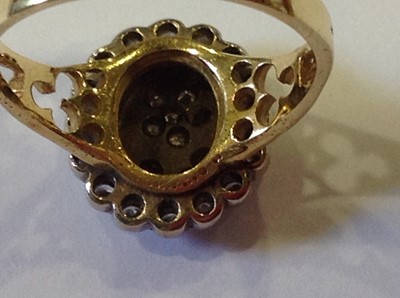 Lot 36 - A diamond and enamel dress ring.