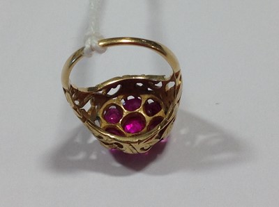 Lot 28 - A vintage ruby cluster ring.
