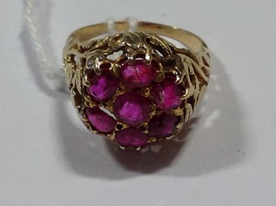 Lot 28 - A vintage ruby cluster ring.