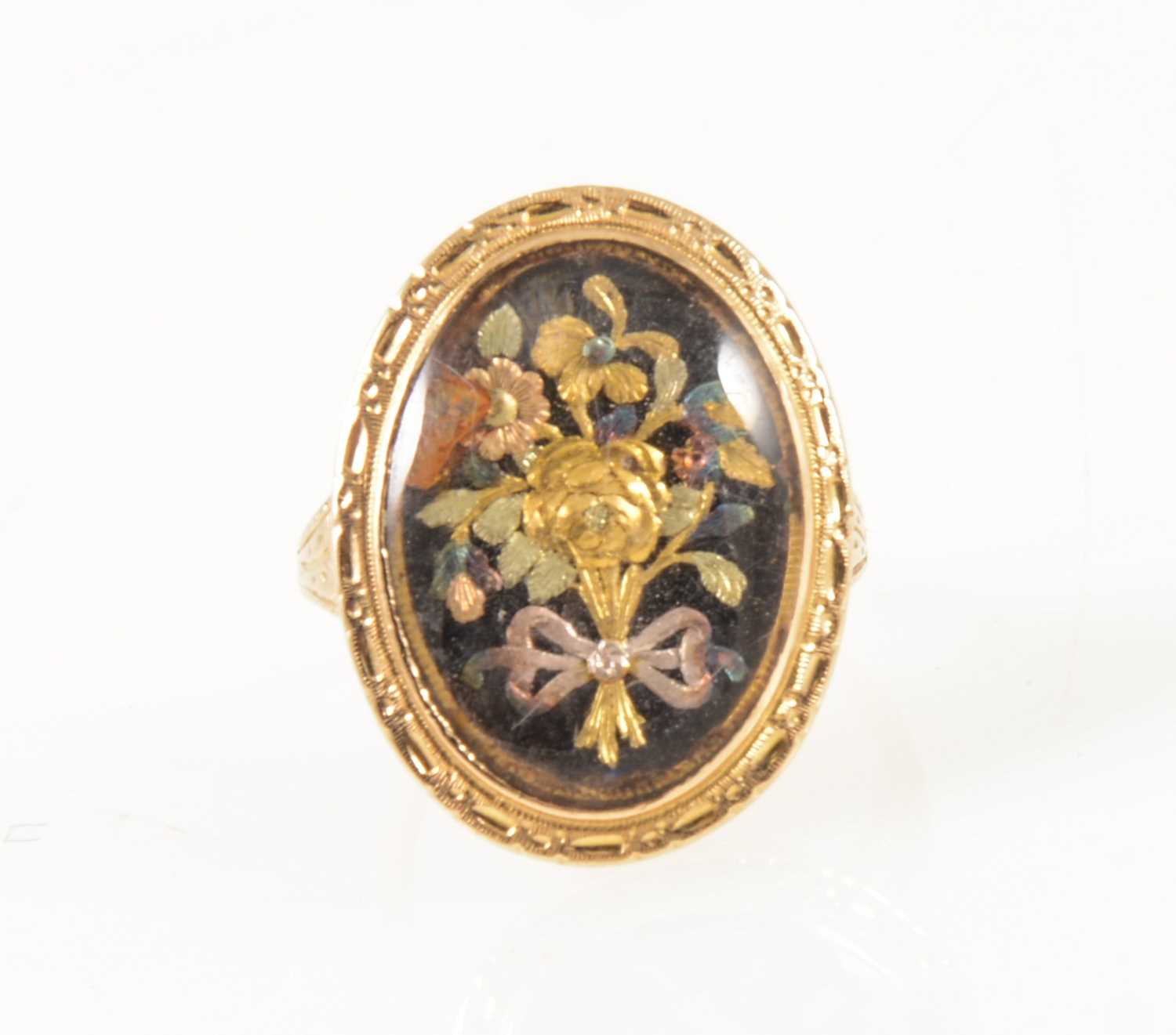 37 - A 19th Century three colour gold ring.