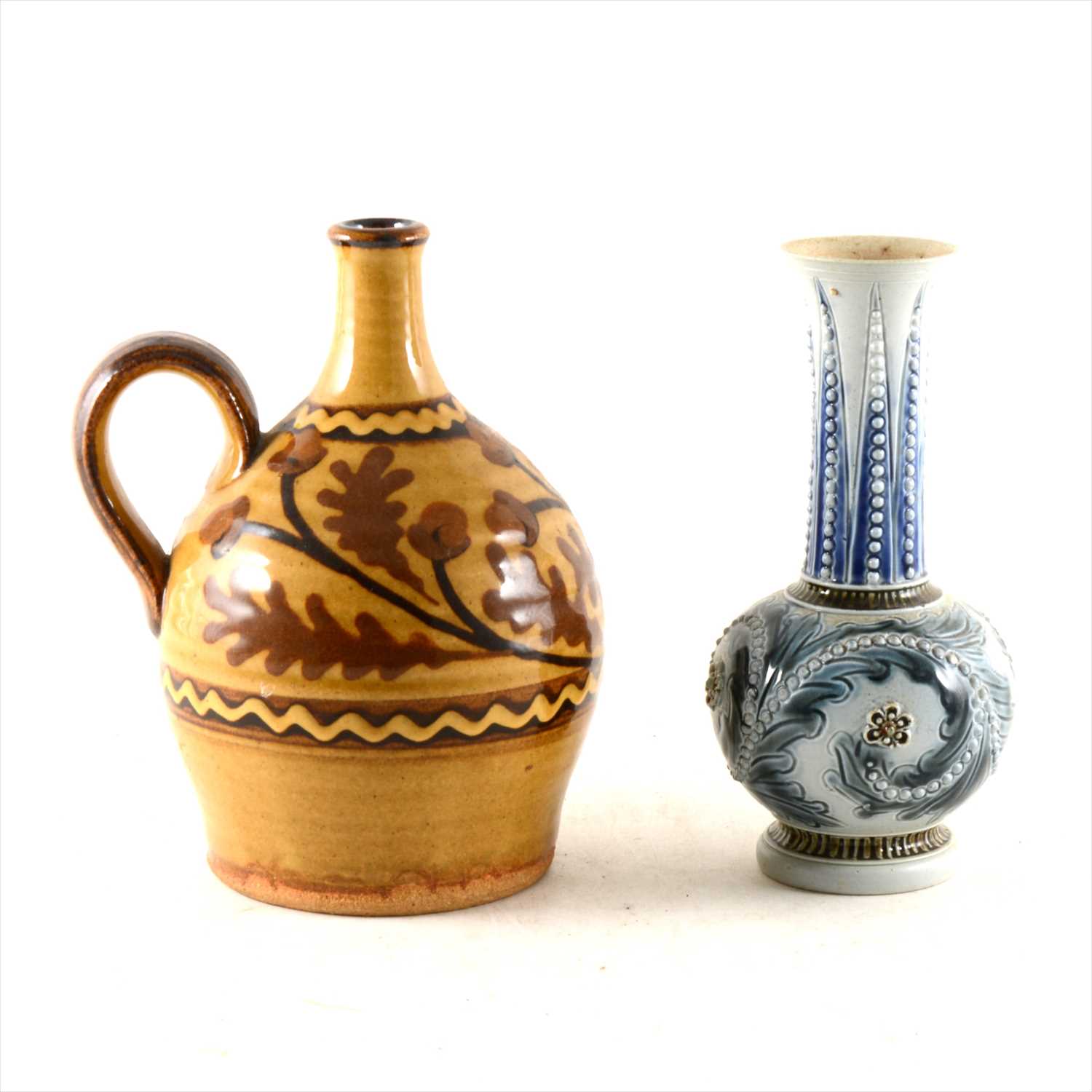Lot 9 - Doulton Lambeth stoneware vase designed by Frank Butler, 1873; and a slipware vase